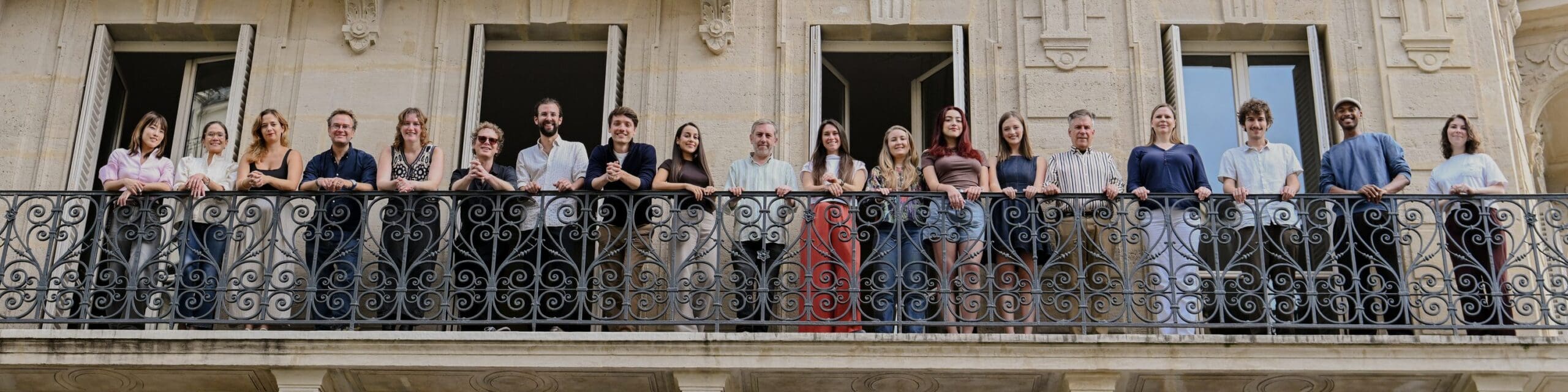 Faculty of the American Conservatory of Paris on a Parisian balcony